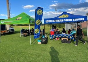South African Police Service tents at a sports field
