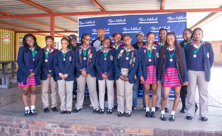 Learners gather for a group photo